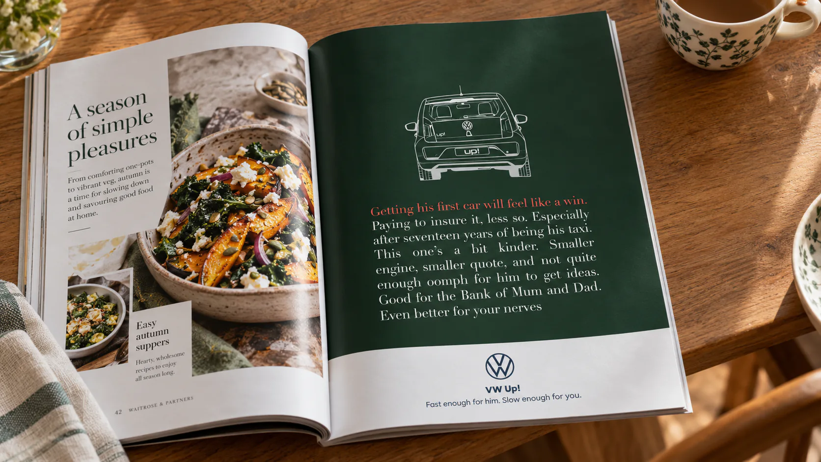 VW Up! insurance print ad in a Waitrose magazine spread