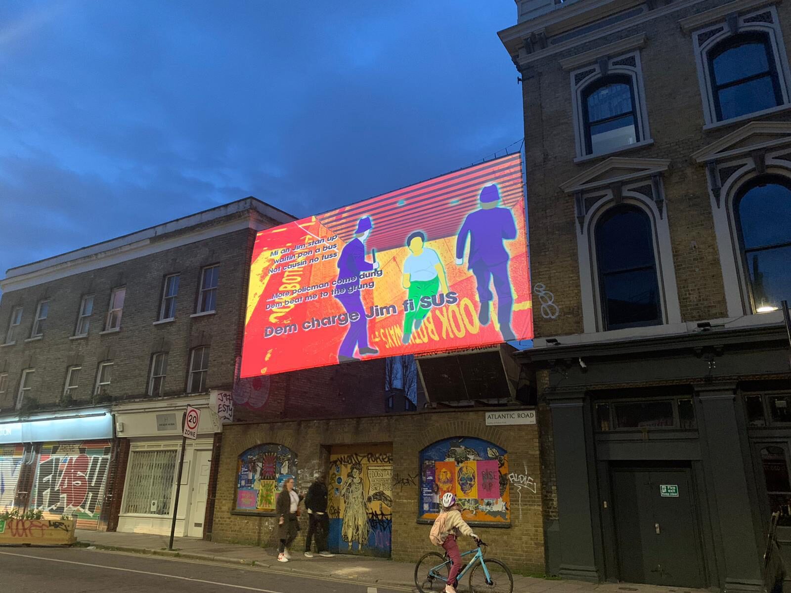 Waymo For Jess animation on a digital billboard on Atlantic Road, Brixton, at dusk
